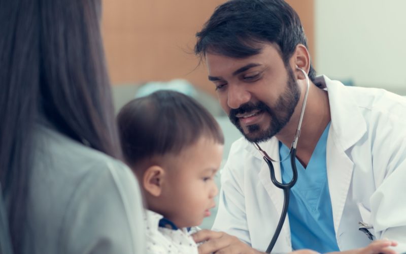 pediatrician examine the child - NU Hospitals